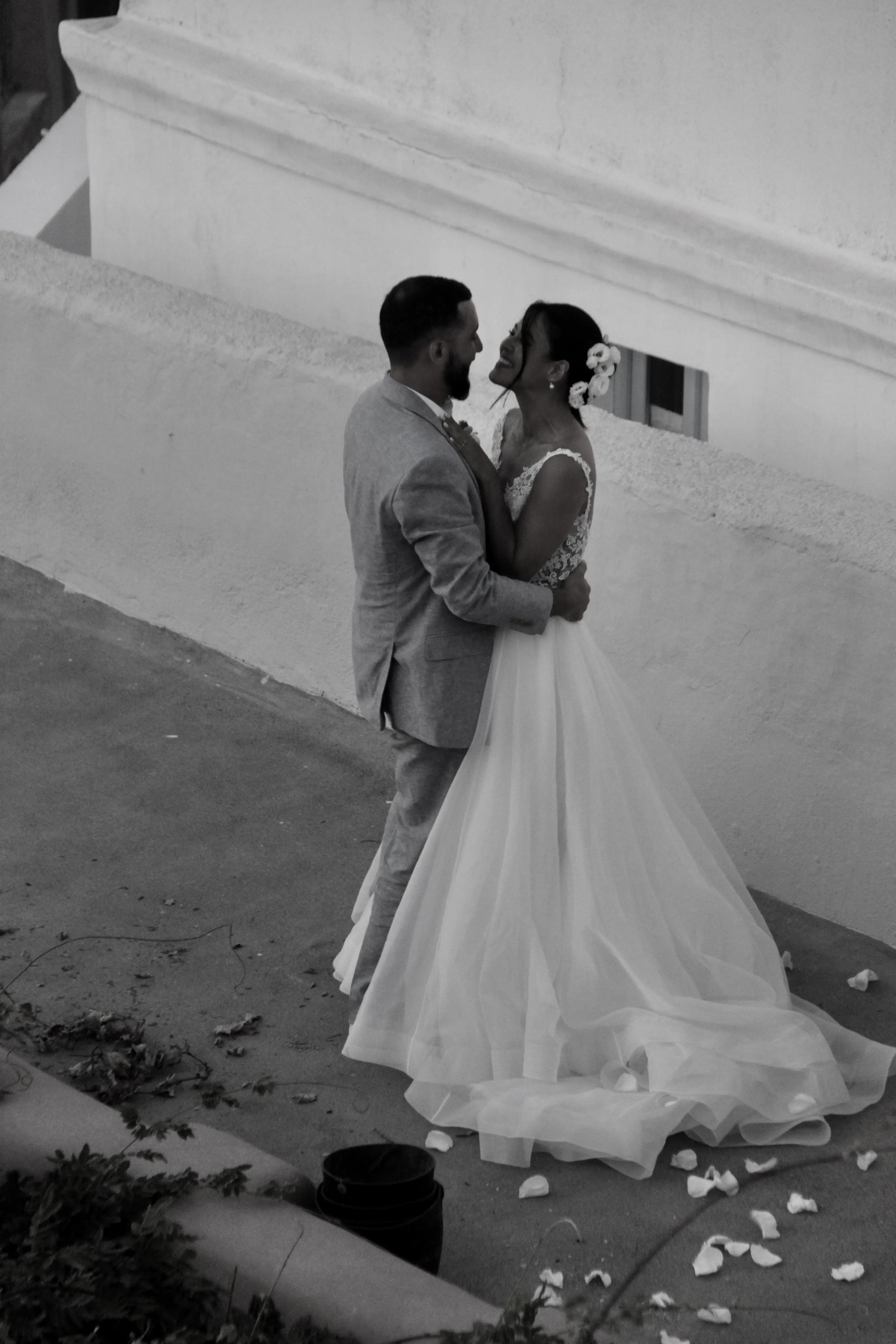 A newly married couple celebrating in Oia
